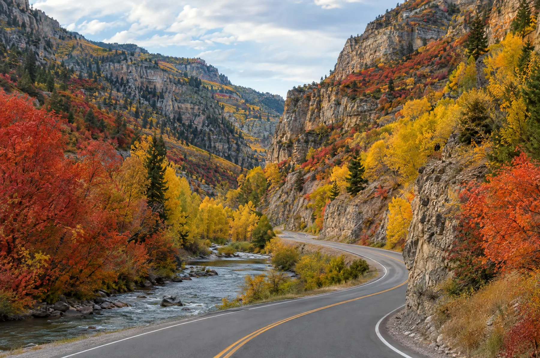 Illustration of autumn colors along a canyon road